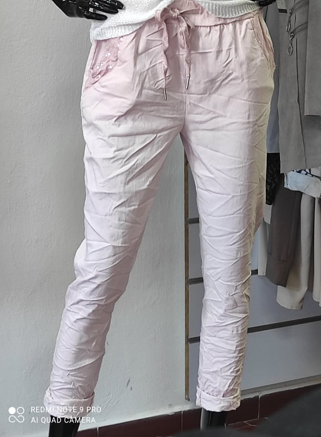 Dámské elastické kalhoty pastelově růžové